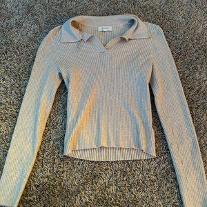 Cream colored long sleeve collared sweater